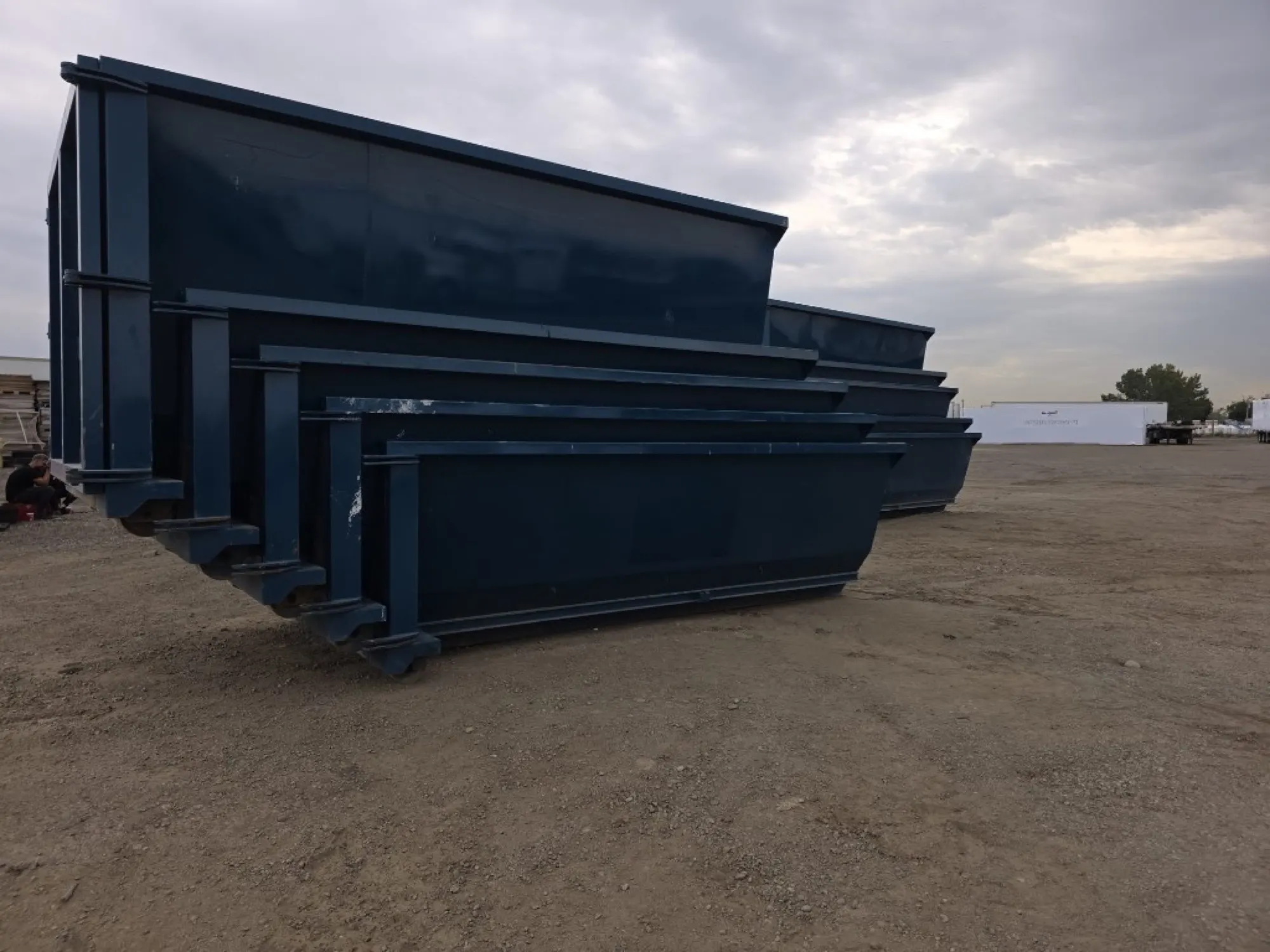 Nested 12, 15 and 20 yard dumpster bins